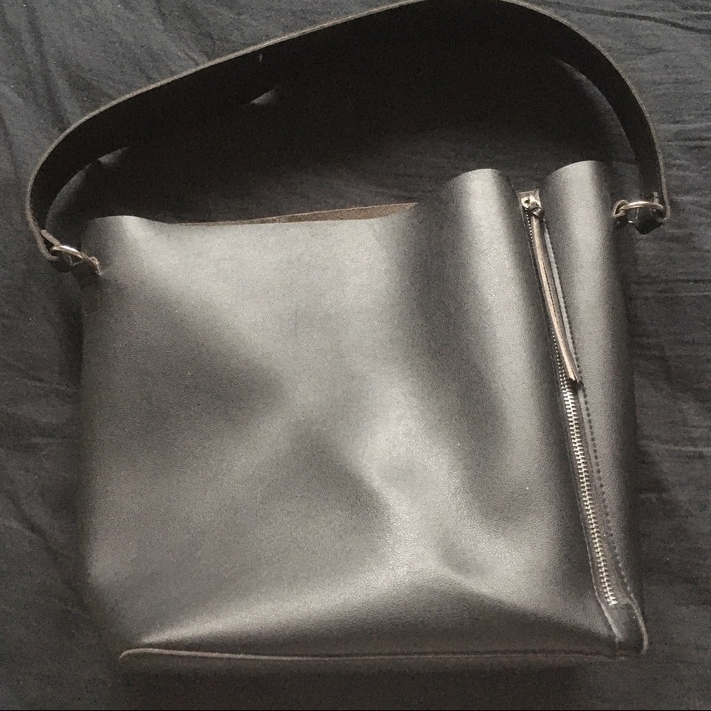 Black faux leather handbag